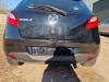 Zderzak tylny z Mazda 2 (DE) 1.3 16V MZR 2011