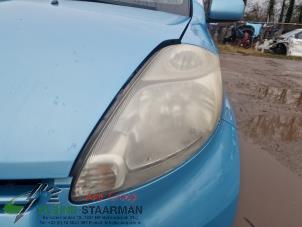 Used Headlight, left Daihatsu Sirion 2 (M3) 1.3 16V DVVT Price on request offered by Kleine Staarman B.V. Autodemontage
