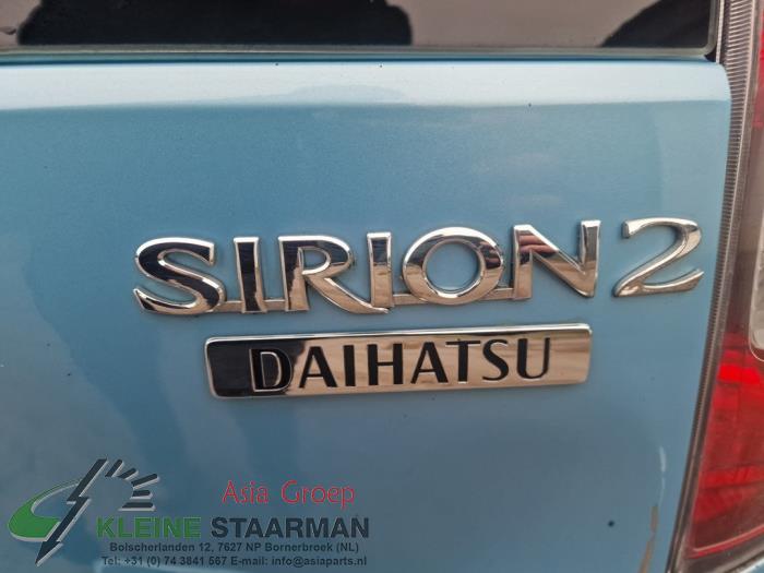 Tylna piasta kola z Daihatsu Sirion 2 (M3) 1.3 16V DVVT 2006