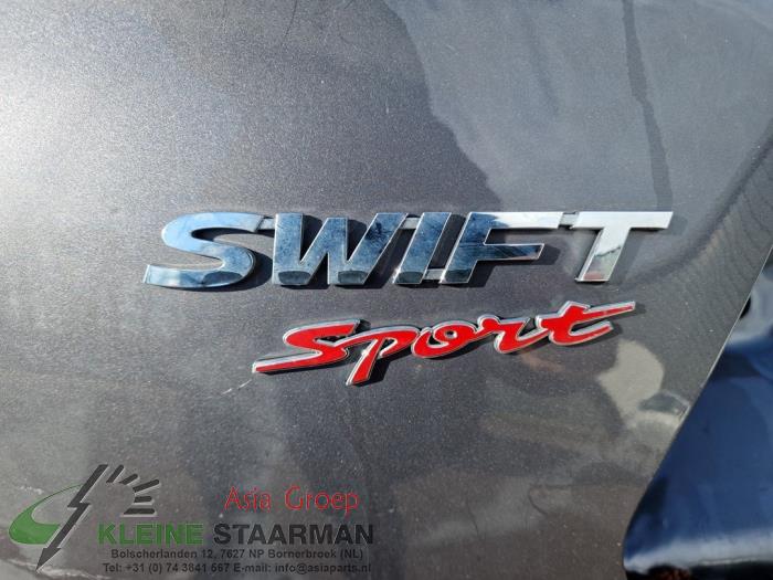 Amortiguador derecha detrás de un Suzuki Swift (ZC/ZD) 1.4 Booster Jet Sport Turbo 16V 2019
