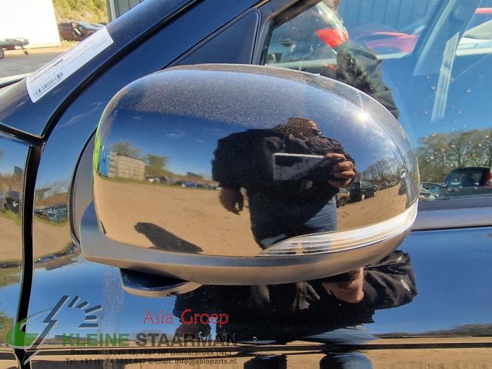 Wing mirror, left from a Hyundai i20 1.2i 16V 2011