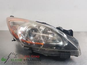 Używane Reflektor prawy Mazda 3 Sport (BL14/BLA4/BLB4) 2.0i MZR DISI 16V Cena na żądanie oferowane przez Kleine Staarman B.V. Autodemontage