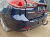Stoßstange hinten van een Mazda 6 SportBreak (GJ/GH/GL) 2.2 SkyActiv-D 150 16V 2016