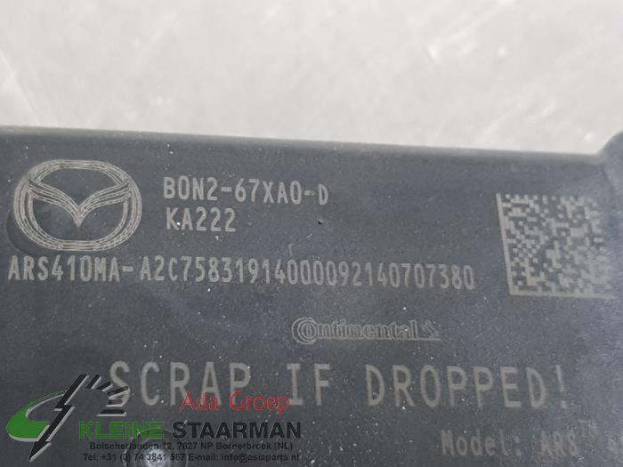 ACC sensor (distance) from a Mazda CX-30 (DM) 2.0 e-SkyActiv X 186 16V 2021