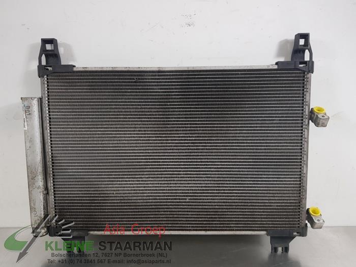 Air conditioning radiator from a Toyota Yaris II (P9) 1.33 16V Dual VVT-I 2009