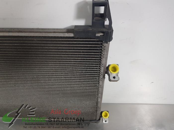 Air conditioning radiator from a Toyota Yaris II (P9) 1.33 16V Dual VVT-I 2009