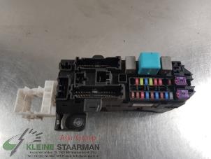 Used Fuse box Daihatsu Cuore (L251/271/276) 1.0 12V DVVT Price on request offered by Kleine Staarman B.V. Autodemontage