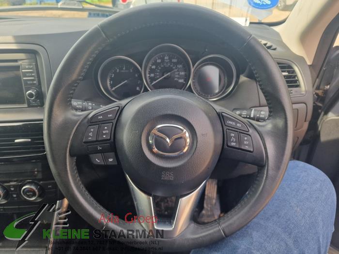 Left airbag (steering wheel) from a Mazda CX-5 (KE,GH) 2.0 SkyActiv-G 165 16V 2WD 2014
