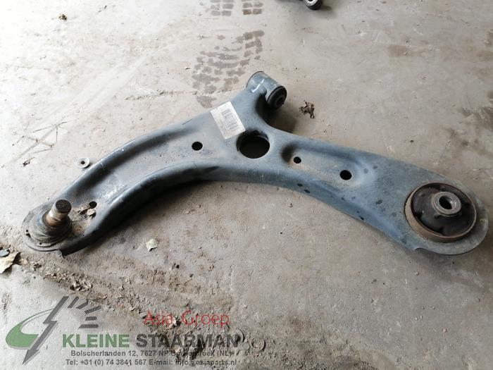 Front lower wishbone, left from a Kia Picanto (JA) 1.0 T-GDI 12V 2021