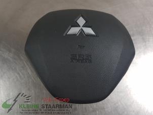 Used Left airbag (steering wheel) Mitsubishi Space Star (A0) 1.2 12V Price on request offered by Kleine Staarman B.V. Autodemontage
