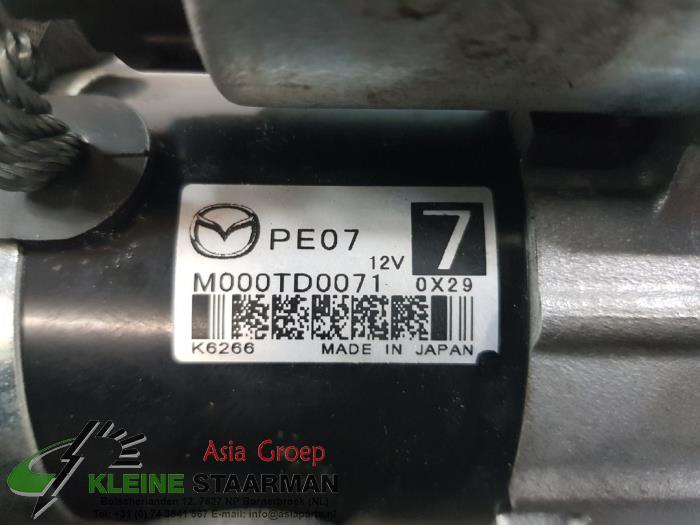 Motor de arranque de un Mazda CX-30 (DM) 2.0 e-SkyActiv-G 122 16V 2021