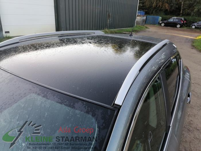 Roof rail, left from a Nissan Qashqai (J11) 1.6 dCi 2016