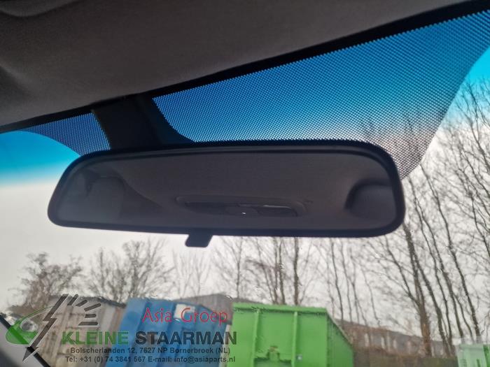Rear view mirror from a Kia Rio III (UB) 1.2 CVVT 16V 2016