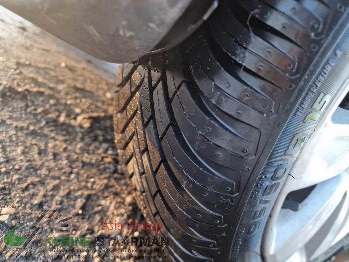 Set of wheels + tyres from a Mitsubishi Colt (Z2/Z3) 1.3 16V 2011