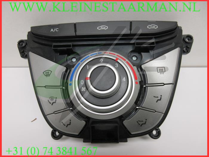 Heater control panel from a Hyundai iX20 (JC) 1.6i 16V 2011