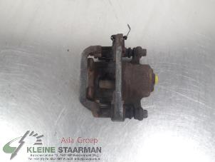 Used Rear brake calliper, left Nissan Qashqai (J10) 2.0 dCi Price on request offered by Kleine Staarman B.V. Autodemontage