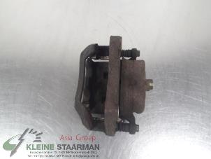Used Front brake calliper, right Nissan Qashqai (J10) 2.0 dCi Price on request offered by Kleine Staarman B.V. Autodemontage