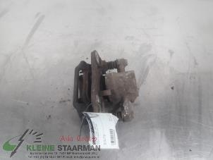 Used Rear brake calliper, left Toyota Avensis Wagon (T25/B1E) 1.8 16V VVT-i Price on request offered by Kleine Staarman B.V. Autodemontage