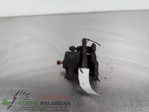 Used Front brake calliper, left Daihatsu Charade (G200/201/202/203/204) 1.3i TX/CX 16V Price on request offered by Kleine Staarman B.V. Autodemontage