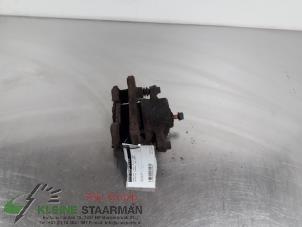 Used Front brake calliper, right Daihatsu Charade (G200/201/202/203/204) 1.3i TX/CX 16V Price on request offered by Kleine Staarman B.V. Autodemontage
