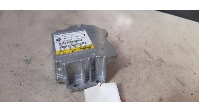 Airbag Module from a BMW 3 serie (E90) 318i 16V 2009