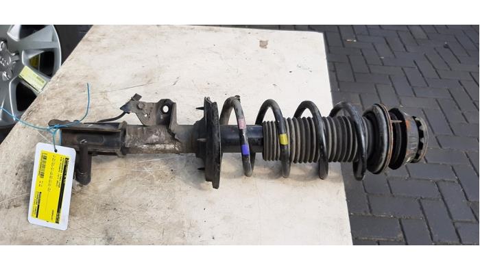 Fronts shock absorber, left from a Kia Picanto (TA) 1.0 12V 2013