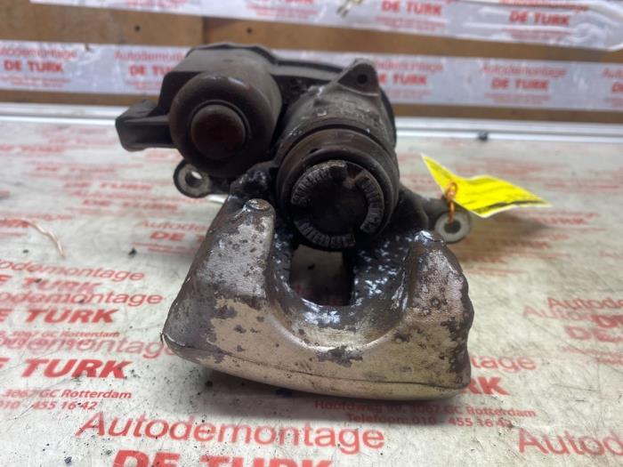 Rear brake calliper, left from a Opel Astra K 1.6 CDTI 110 16V 2016