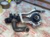 Water pump from a Opel Astra J (PC6/PD6/PE6/PF6) 1.4 Turbo 16V 2012