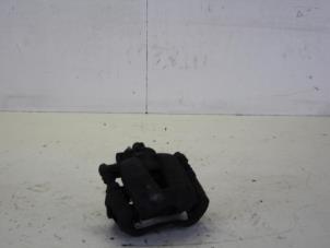 Usados Pinza de freno derecha delante Opel Corsa D 1.3 CDTi 16V ecoFLEX Precio € 30,00 Norma de margen ofrecido por Gebr Opdam B.V.
