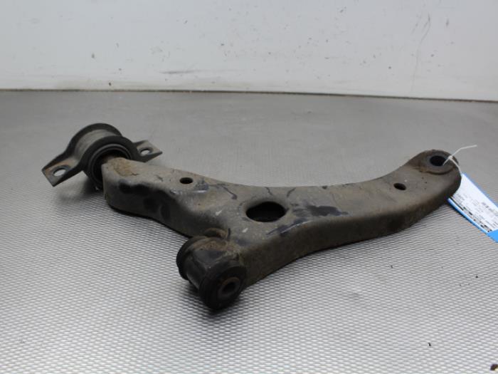 Front lower wishbone, left from a Ford Transit Connect 1.8 TDCi 90 2012