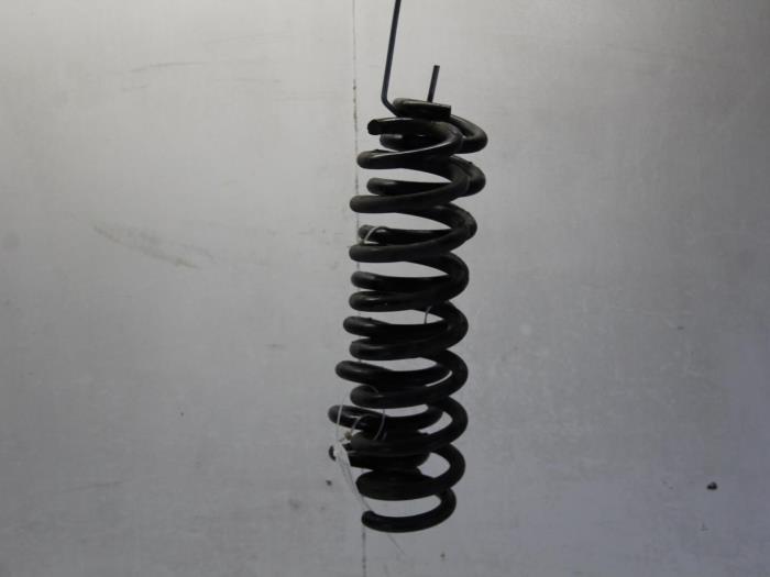 Rear coil spring from a BMW 3 serie (E90) 318i 16V 2007