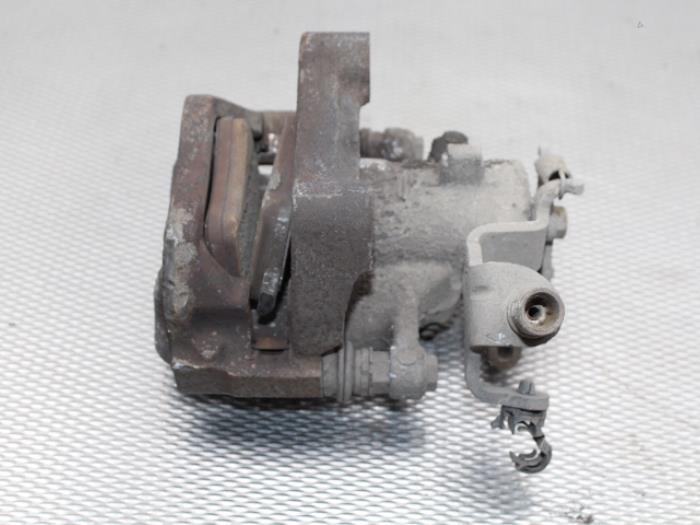 Rear brake calliper, left from a Peugeot 5008 I (0A/0E) 1.6 VTI 16V 2011