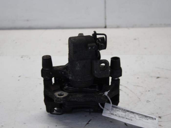 Rear brake calliper, left from a Renault Espace (JK) 2.0 16V Turbo 2004