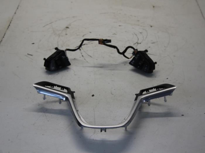 Steering wheel mounted radio control from a Opel Insignia  2010