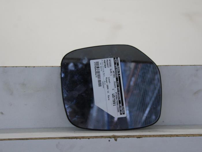 Mirror glass, left from a Peugeot Partner 1.9D 2004