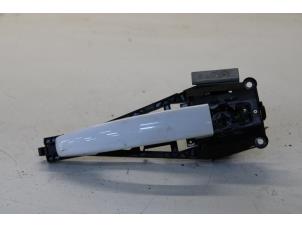 Used Door handle 2-door, left Opel Corsa E 1.0 SIDI Turbo 12V Price on request offered by Gebr Opdam B.V.