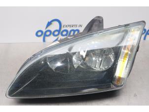 Used Headlight, left Ford Focus 2 Wagon 1.8 TDCi 16V Price € 40,00 Margin scheme offered by Gebr Opdam B.V.