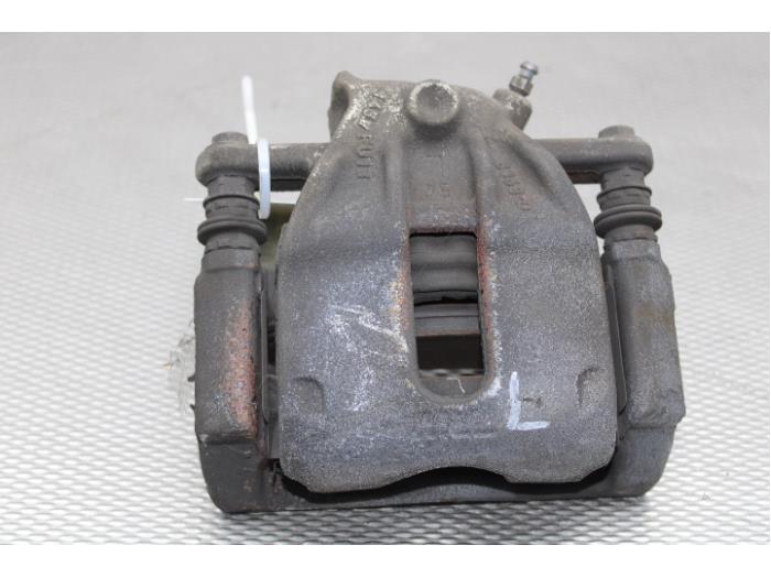 Front brake calliper, left from a Renault Kangoo Express (FW) 1.5 dCi 75 FAP 2019