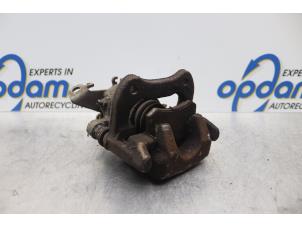 Used Rear brake calliper, right Renault Scénic I (JA) 1.6 16V Price € 30,00 Margin scheme offered by Gebr Opdam B.V.