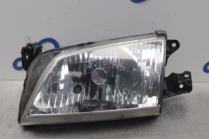 Used Headlight, left Mazda Demio (DW) 1.3 16V Price € 50,00 Margin scheme offered by Gebr Opdam B.V.