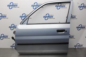Used Door 4-door, front left Mazda Demio (DW) 1.5 16V Price € 80,00 Margin scheme offered by Gebr Opdam B.V.