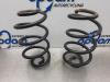 Rear coil spring from a Renault Modus/Grand Modus (JP), 2004 / 2012 1.2 16V, MPV, Petrol, 1.149cc, 55kW (75pk), FWD, D4F740; D4FD7, 2004-12 / 2012-12, JP0C; JP0K; JP0R; JP1C; JP1R; JP2C; JP3C; JPGC; JPHC 2005