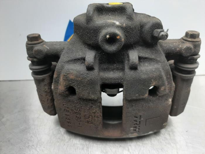 Front brake calliper, left from a Mitsubishi Colt CZC 1.5 16V 2006