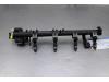 Injector (petrol injection) from a Ford Fiesta 6 (JA8), 2008 / 2017 1.25 16V, Hatchback, Petrol, 1.242cc, 60kW (82pk), FWD, SNJB, 2008-06 / 2017-04 2010