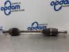 Renault Clio III (BR/CR) 1.2 16V 75 Front drive shaft, left