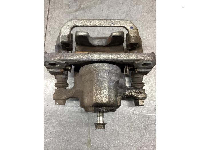 Rear brake calliper, left from a Nissan Leaf (ZE1) 40kWh 2019