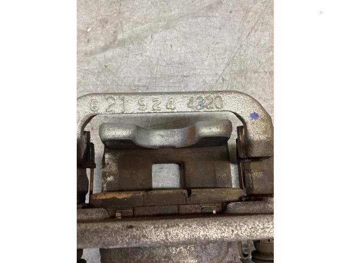 Rear brake calliper, left from a Nissan Leaf (ZE1) 40kWh 2019