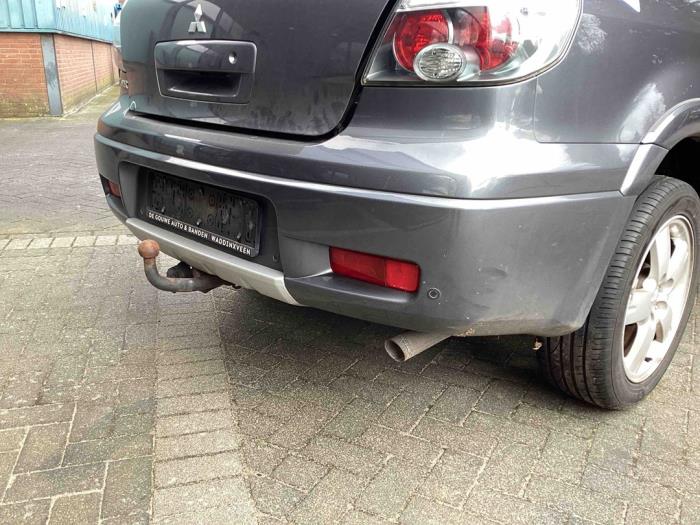 Rear bumper Mitsubishi Outlander 2.4 16V 4x4 A39E - XXXXX