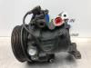 Air conditioning pump from a Daihatsu Sirion 2 (M3), 2005 1.0 12V DVVT, Hatchback, Petrol, 998cc, 51kW (69pk), FWD, 1KRFE, 2005-01 / 2013-06, M300 2008