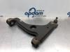 Front lower wishbone, left from a Opel Astra G (F08/48) 1.6 16V 2002
